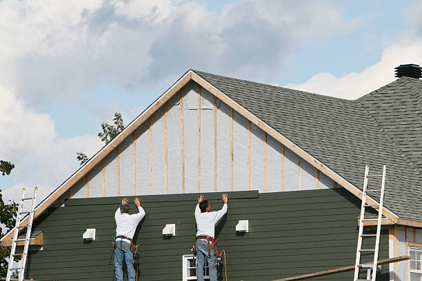 Professional Siding Installation technician working in Shamokin Dam, PA